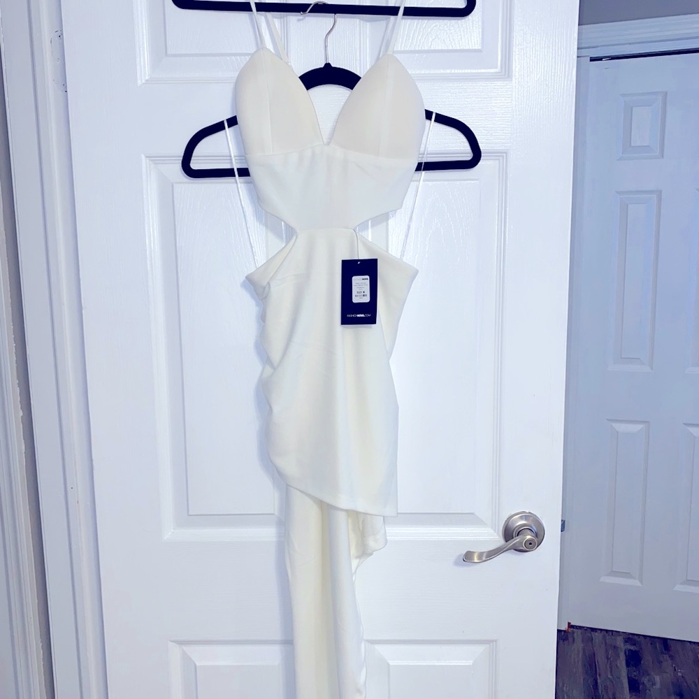 White Asymmetrical dress. Brand New !!!